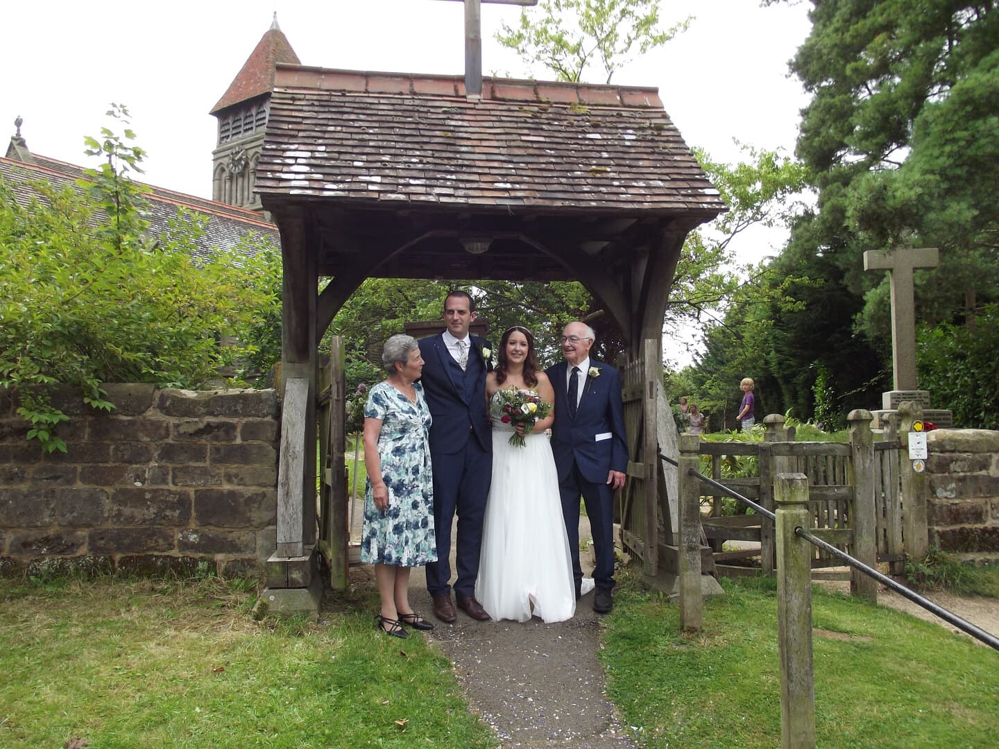 A wedding party outside St James